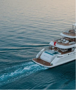 Aerial view of a luxury superyacht cruising on open water